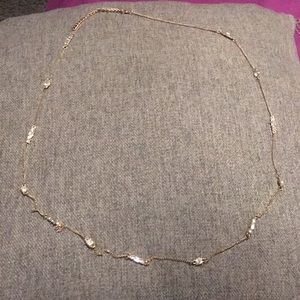 Simple elegant gold band with jewels